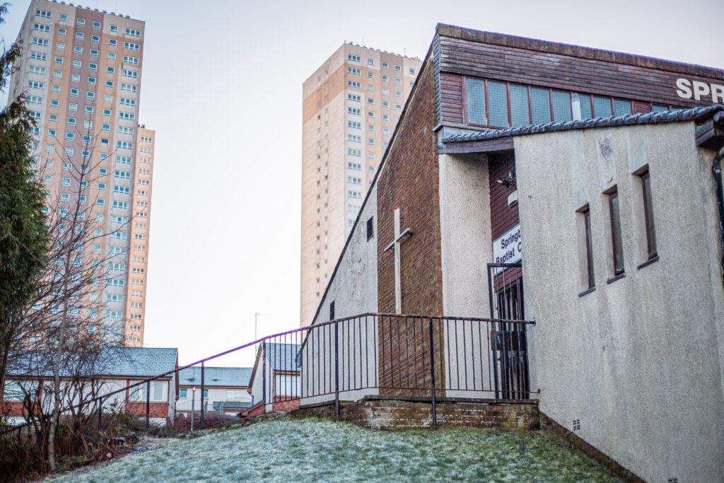 Photo of Springburn Baptist Church with the flats behind it